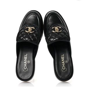 CHANEL Quilted Black Loafers with Gold Accent
